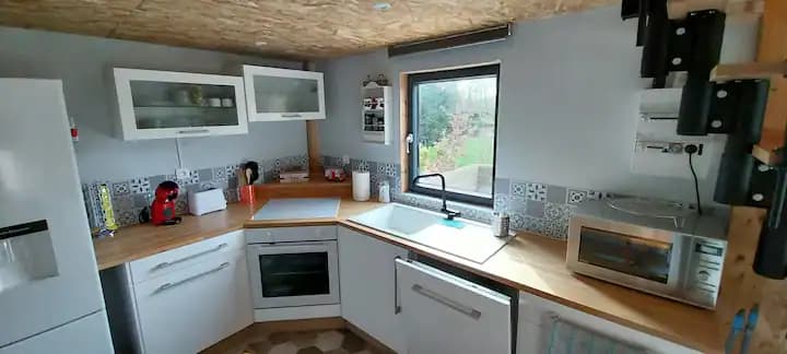 Chalet rénové au bord d’une petite marre avec vue sur la rivière la tortue?