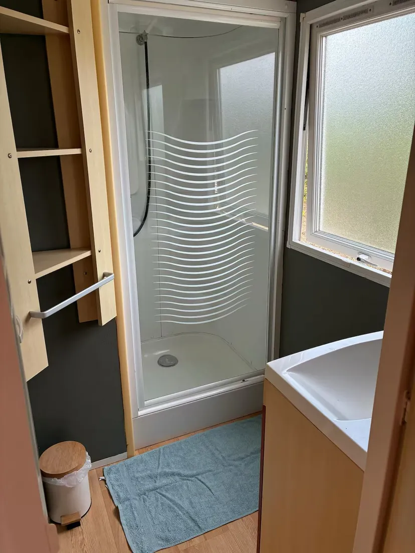 Mobile home with fish pond in the Great East