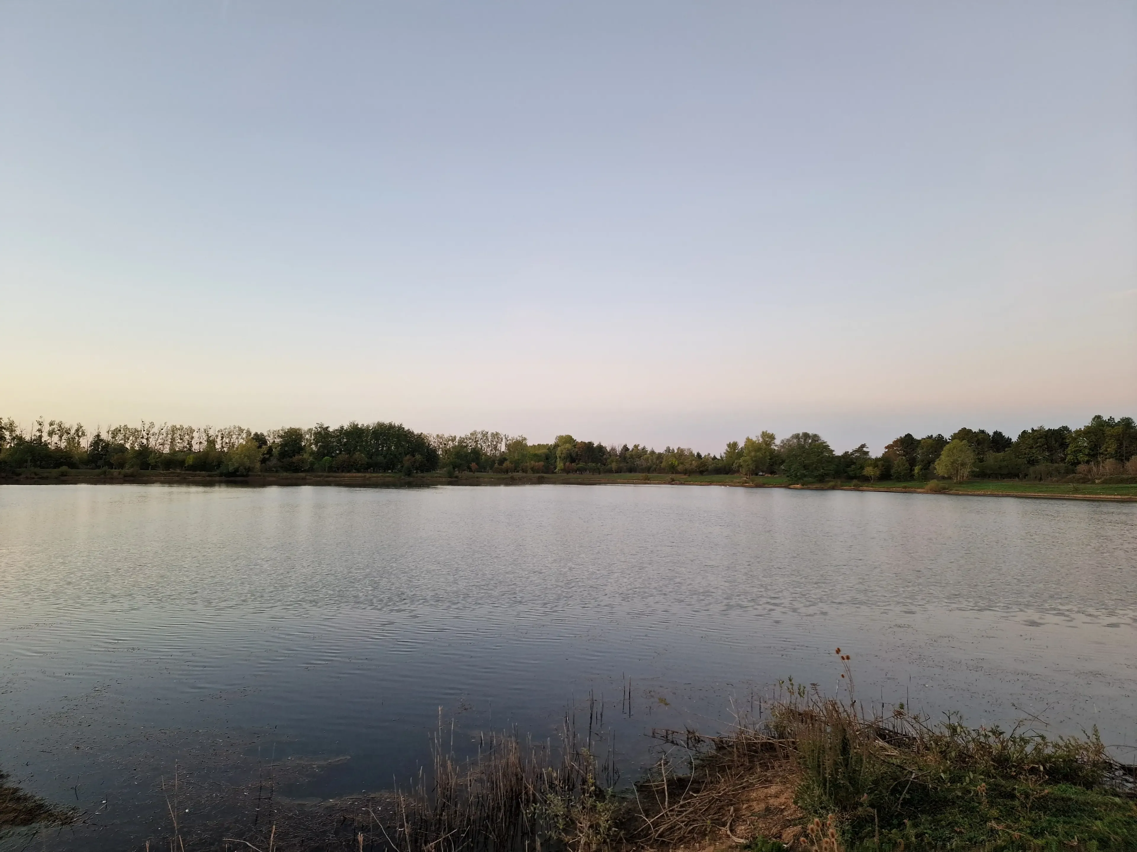 Private pond by day with launch near Auxerre – Yonne