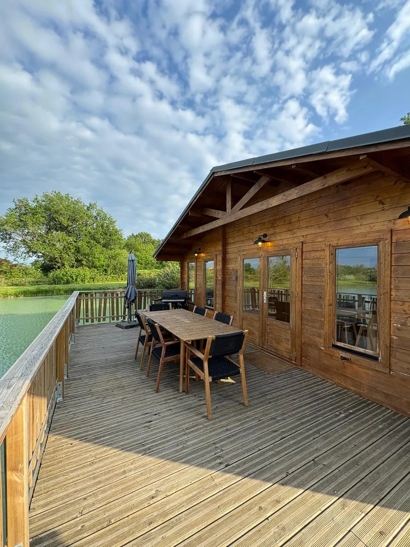 Rent a private pond with chalet and a terrace suspended on the water