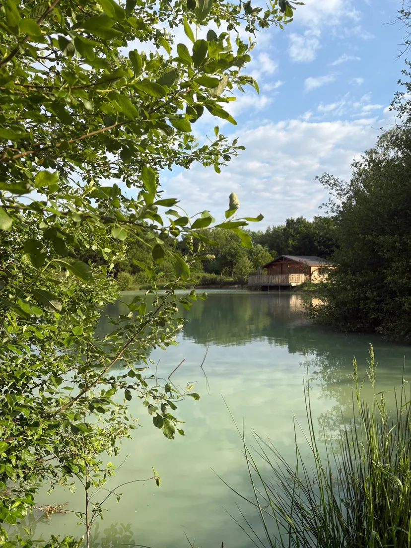 Rent a private pond with chalet and a terrace suspended on the water