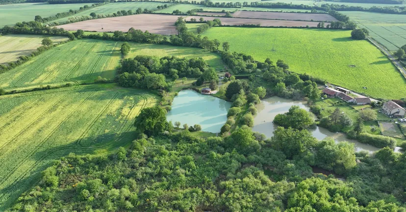 Rent a private pond with chalet and a terrace suspended on the water