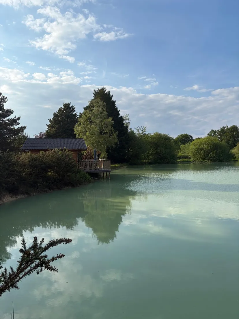 Rent a private pond with chalet and a terrace suspended on the water