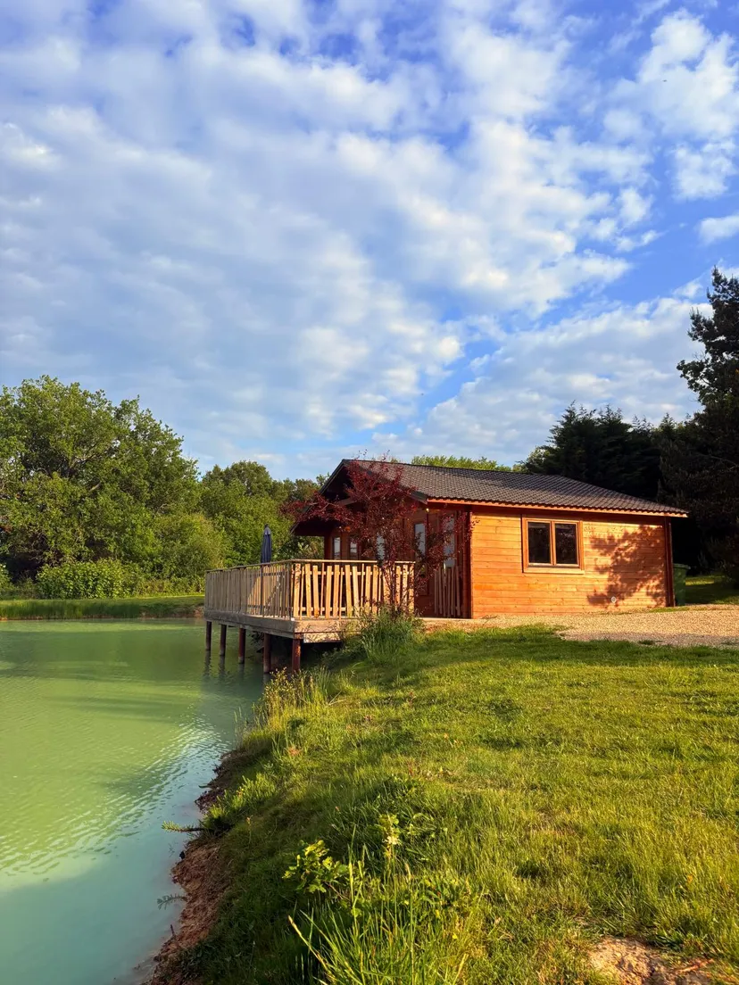 Rent a private pond with chalet and a terrace suspended on the water