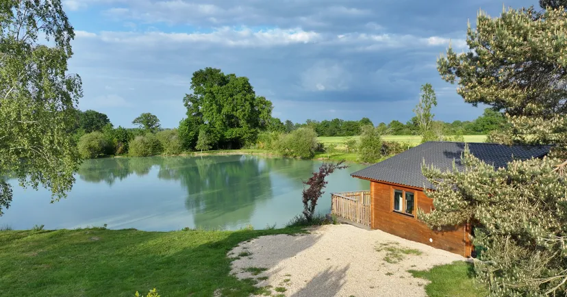 Rent a private pond with chalet and a terrace suspended on the water