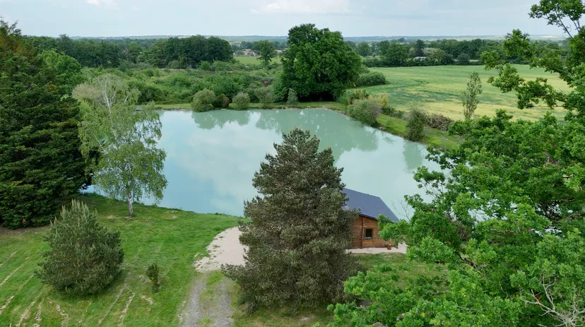 Rent a private pond with chalet and a terrace suspended on the water