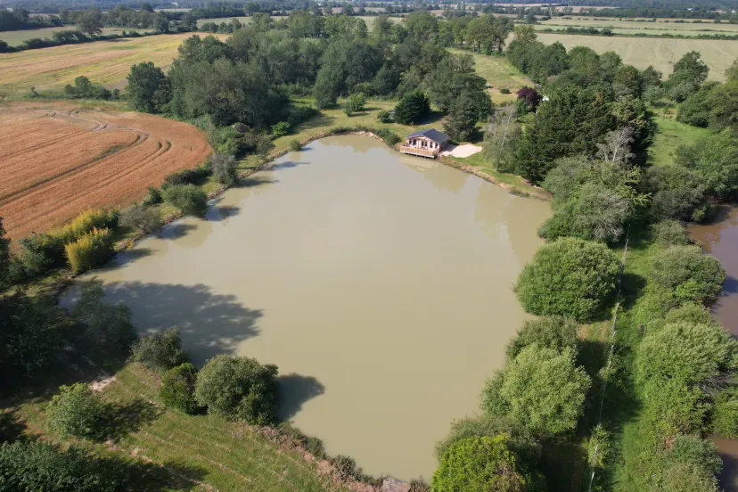 Rent a private pond with chalet and a terrace suspended on the water