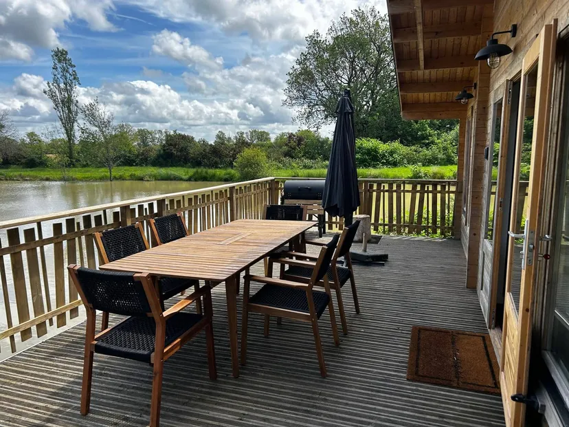 Rent a private pond with chalet and a terrace suspended on the water