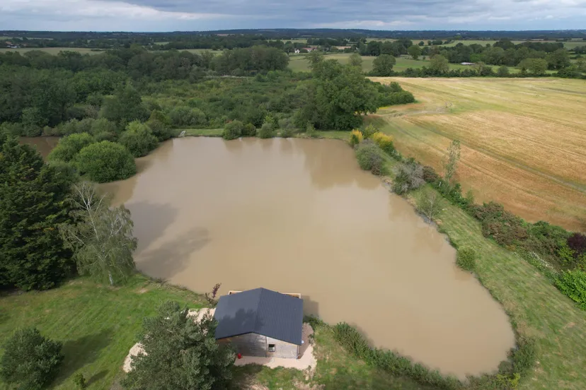 Rent a private pond with chalet and a terrace suspended on the water