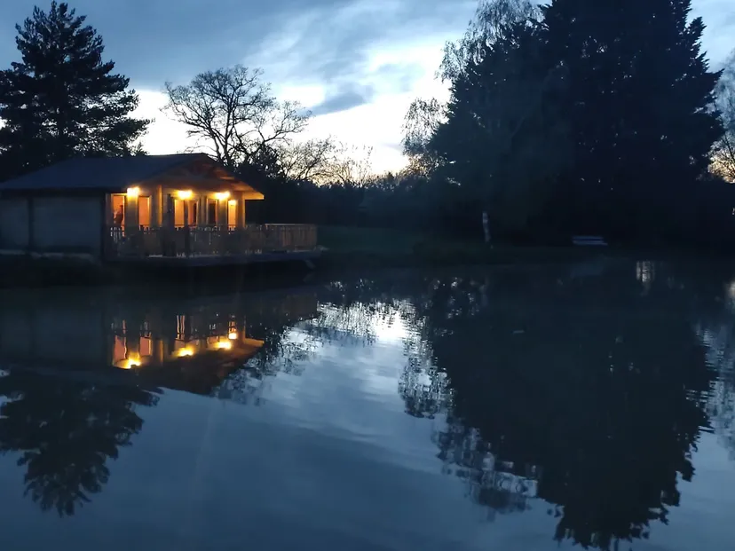 Rent a private pond with chalet and a terrace suspended on the water