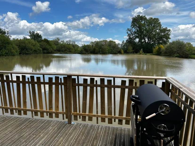 Rent a private pond with chalet and a terrace suspended on the water